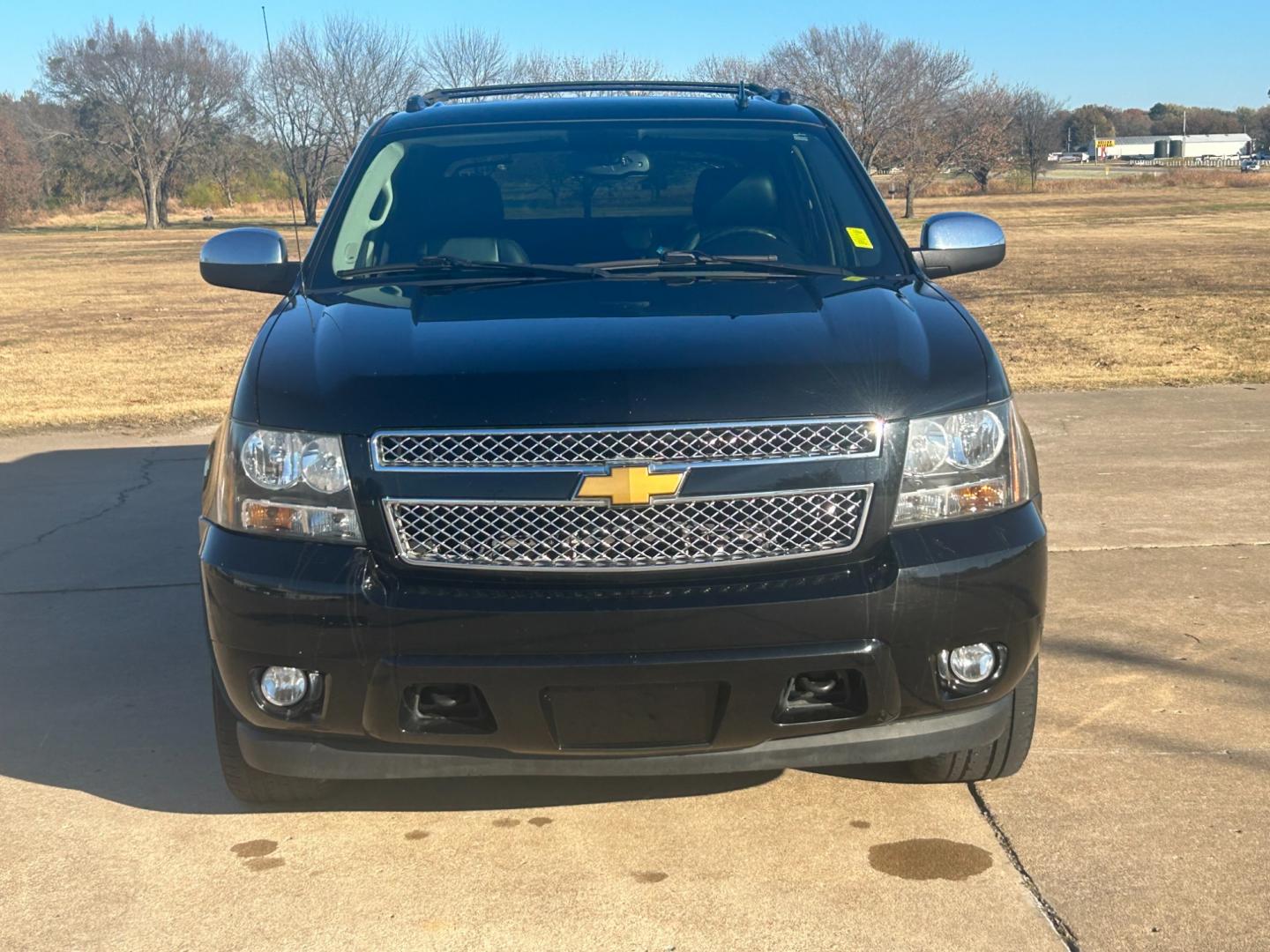 2012 BLACK /BLACK Chevrolet Avalanche LTZ (3GNTKGE75CG) with an 5.3L V8 OHV 16V FFV engine, AUTOMATIC transmission, located at 17760 Hwy 62, Morris, OK, 74445, (918) 733-4887, 35.609104, -95.877060 - 2012 CHEVROLET AVALANCHE LTZ HAS A 5.3L V8 ENGINE AND IS 4WD. THIS TRUCK IS BI-FUEL WHICH RUNS ON BOTH CNG(COMPRESSED NATURAL GAS) OR GASOLINE, IT FEATURES KEYLESS ENTRY REMOTE, REMOTE START, POWER LOCKS, POWER WINDOWS, POWER SEATS, POWER MIRRORS, POWER ADJUSTABLE FOOT PEDAL, AM/FM STEREO, CD PLAYER - Photo#1